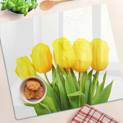 Skleněná deska do kuchyně Žluté tulipány na zeleném pozadí