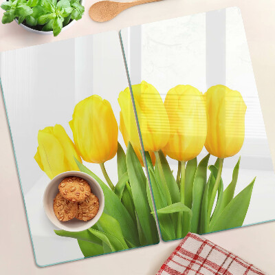 Skleněná deska do kuchyně Žluté tulipány na zeleném pozadí
