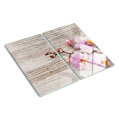 Skleněná krájecí deska Orchideje na dřevěném pozadí
