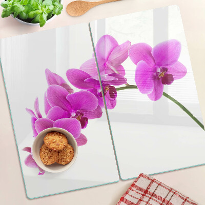 Skleněná deska do kuchyně Květy orchidejí v odstínech růžové