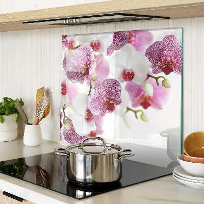 Skleněná deska do kuchyně Orchideje před oknem