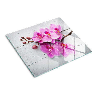 Skleněná deska do kuchyně Orchideje na bílém pozadí