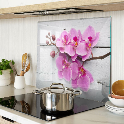 Skleněná deska do kuchyně Orchideje na bílém pozadí