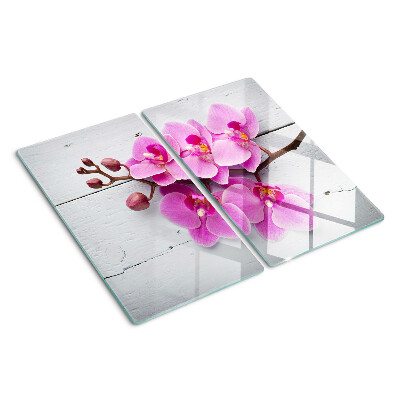 Skleněná deska do kuchyně Orchideje na bílém pozadí