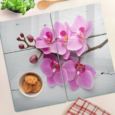 Skleněná deska do kuchyně Orchideje na bílém pozadí