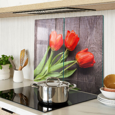 Skleněná krájecí deska Tulipány na dřevěném pozadí
