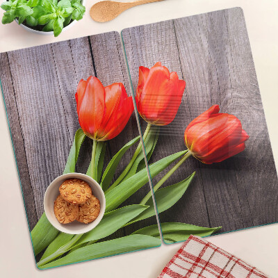 Skleněná krájecí deska Tulipány na dřevěném pozadí