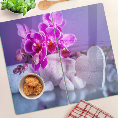 Skleněná deska do kuchyně Orchideje na kamenech