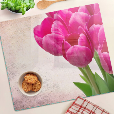 Skleněná krájecí deska Tulipánové květy na růžovém pozadí