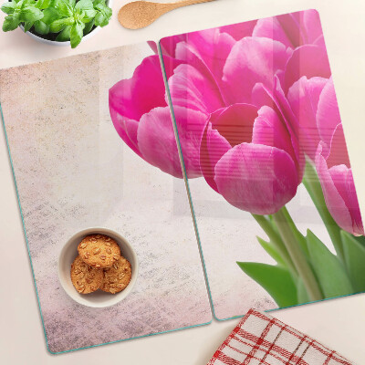 Skleněná krájecí deska Tulipánové květy na růžovém pozadí