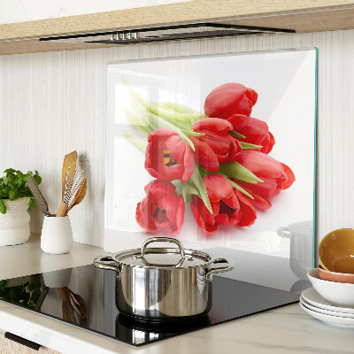 Skleněná deska do kuchyně Červené tulipány na bílém pozadí