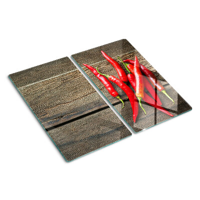 Skleněná krájecí deska Chilli papričky na dřevěném pozadí