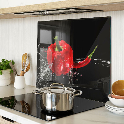 Skleněná deska do kuchyně Červená paprika ve vodě