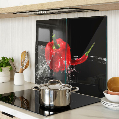 Skleněná deska do kuchyně Červená paprika ve vodě