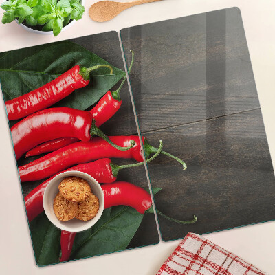 Skleněná deska do kuchyně Chilli papričky na dřevěném pozadí