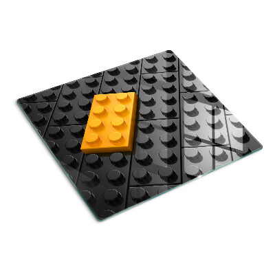 Skleněná deska do kuchyně LEGO kostky na černém pozadí