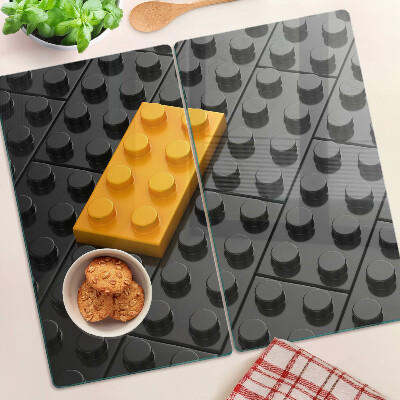 Skleněná deska do kuchyně LEGO kostky na černém pozadí