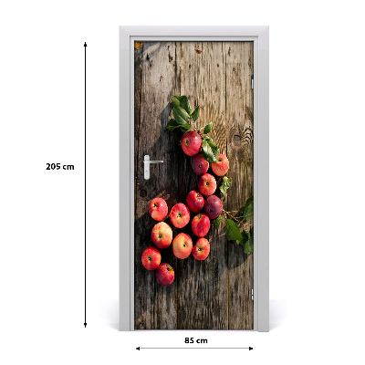 Fototapeta na dveře samolepící jablka na stole