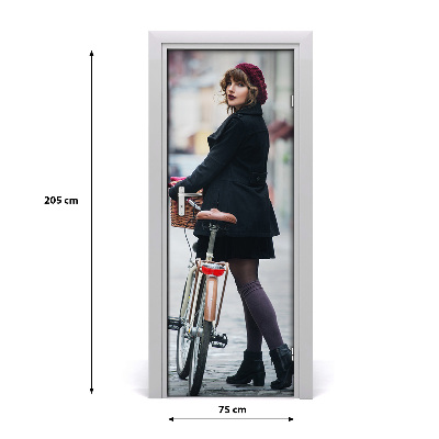 Fototapeta samolepící dveře žena na kole