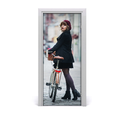 Fototapeta samolepící dveře žena na kole
