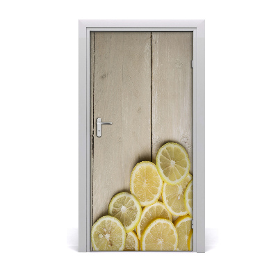 Fototapeta na dveře samolepící citrony na dřevě