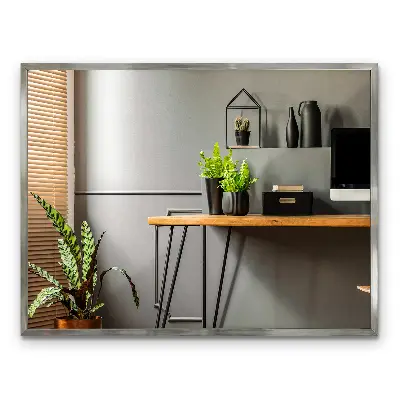 Nástěnné zrcadlo ve stříbrném rámu minimalistické provedení
