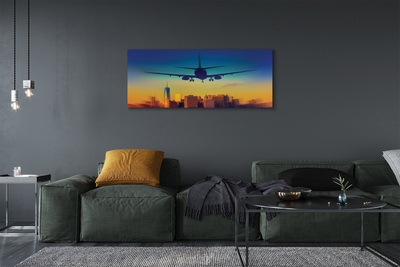 Obrazy na plátně Velkoměsto oblačnosti letadlo západ
