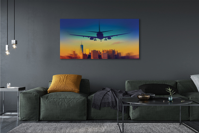 Obrazy na plátně Velkoměsto oblačnosti letadlo západ