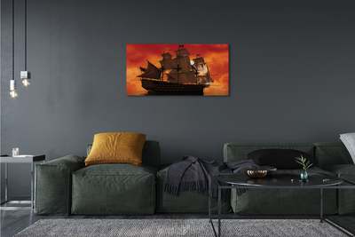 Obrazy na plátně Loď moře oranžová obloha