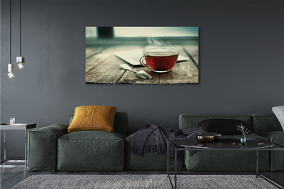 Obrazy na plátně Ohřívat lžičku čaje