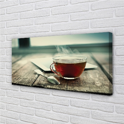 Obrazy na plátně Ohřívat lžičku čaje