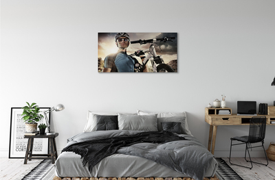 Obrazy na plátně Cyklista na kole mraky