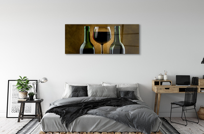 Obraz na skle 2 láhve sklenice na víno