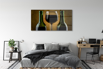 Obraz na skle 2 láhve sklenice na víno