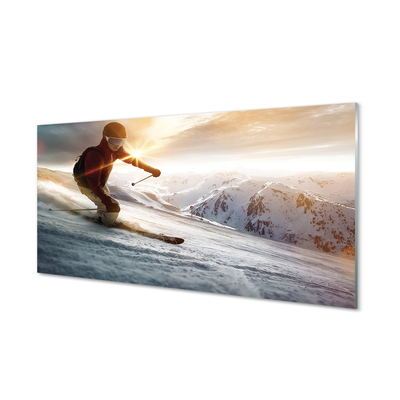 Obraz na skle lyžařské hůlky muž