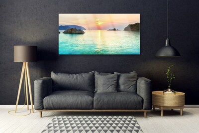 Obraz na skle Slunce Skály Moře Krajina