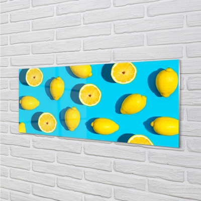 Skleněný panel Citrony na modrém pozadí