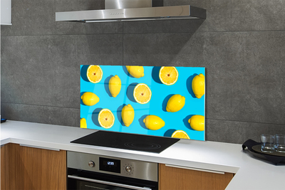 Skleněný panel Citrony na modrém pozadí