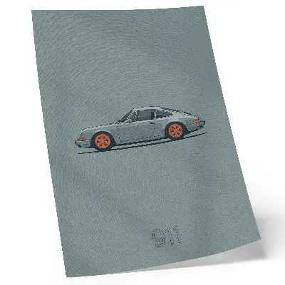 Plakátový obraz klasické auto s oranžovými ráfky na šedém pozadí