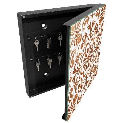 Designová skříňka na klíče s ornamentálním dezénem
