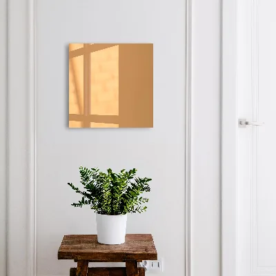 Designová skříňka na klíče v tlumené oranžové barvě