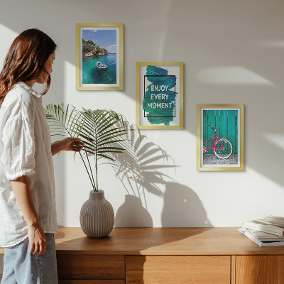Vícedílný obraz v rámu Výhled na moře s inspirativním nápisem na lodi a kole