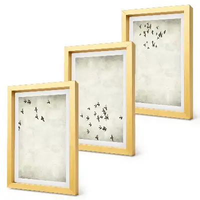 Sada tří obrazů minimalistický motiv letících ptáků