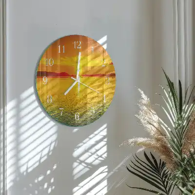 Kulaté skleněné hodiny na stěnu Západ slunce